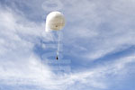 Blimp in the clouds 